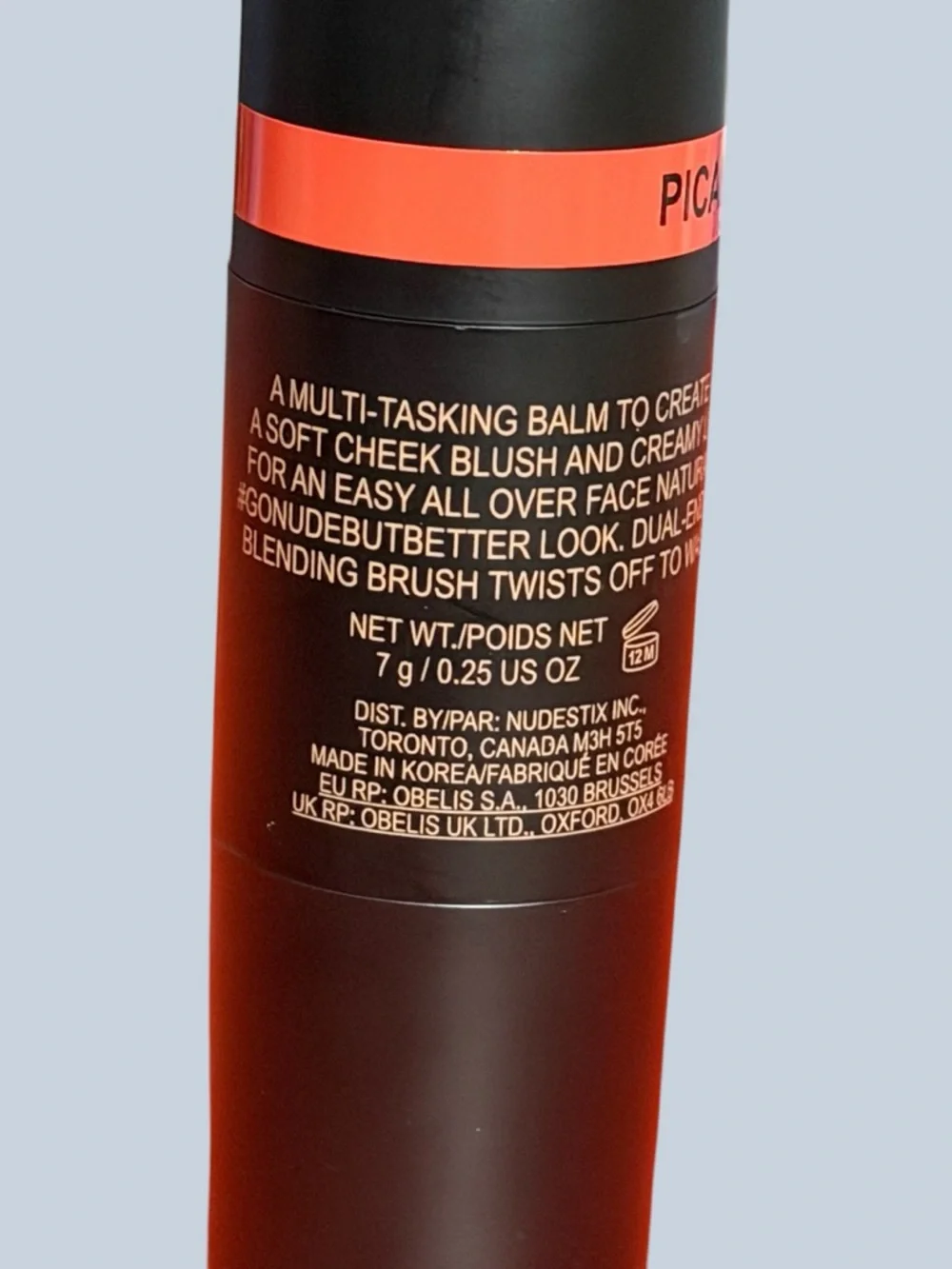 Nude Stix Multi tasking Balm in PICANTE Bright Red Orange Cream Stick